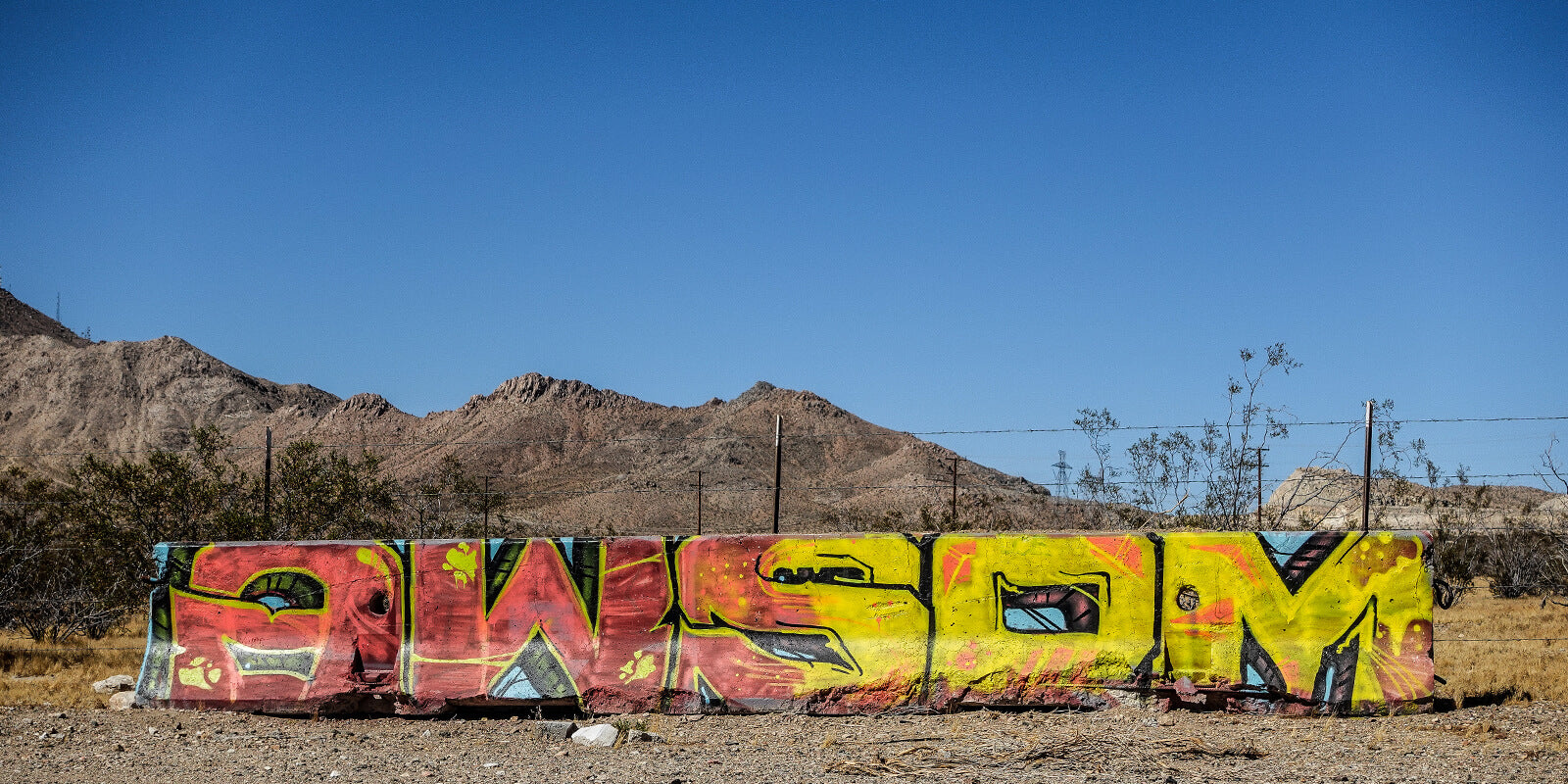 "AWSOM" Graffiti K-Rail California Banner Image